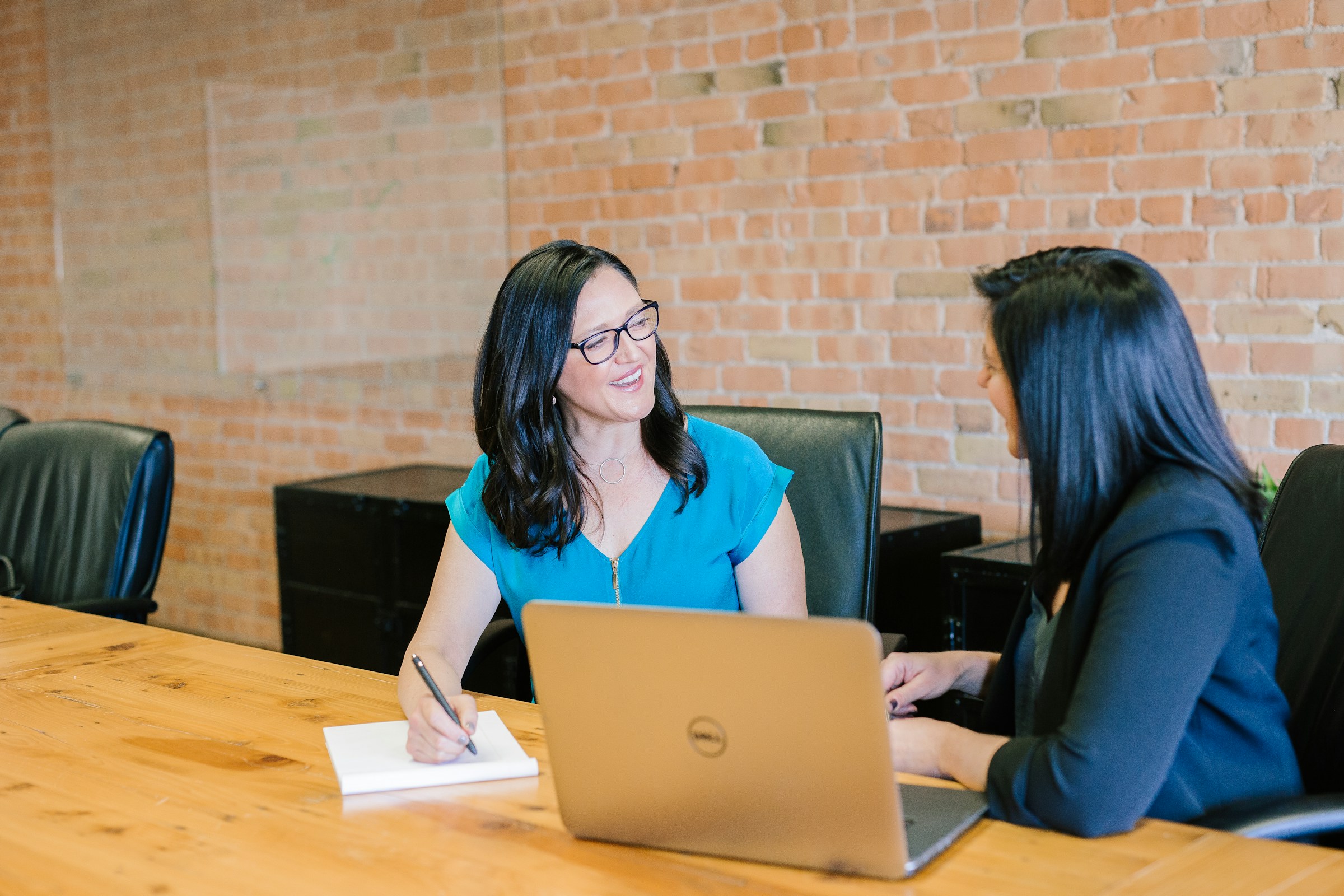person making notes - Wix SEO Expert Cost