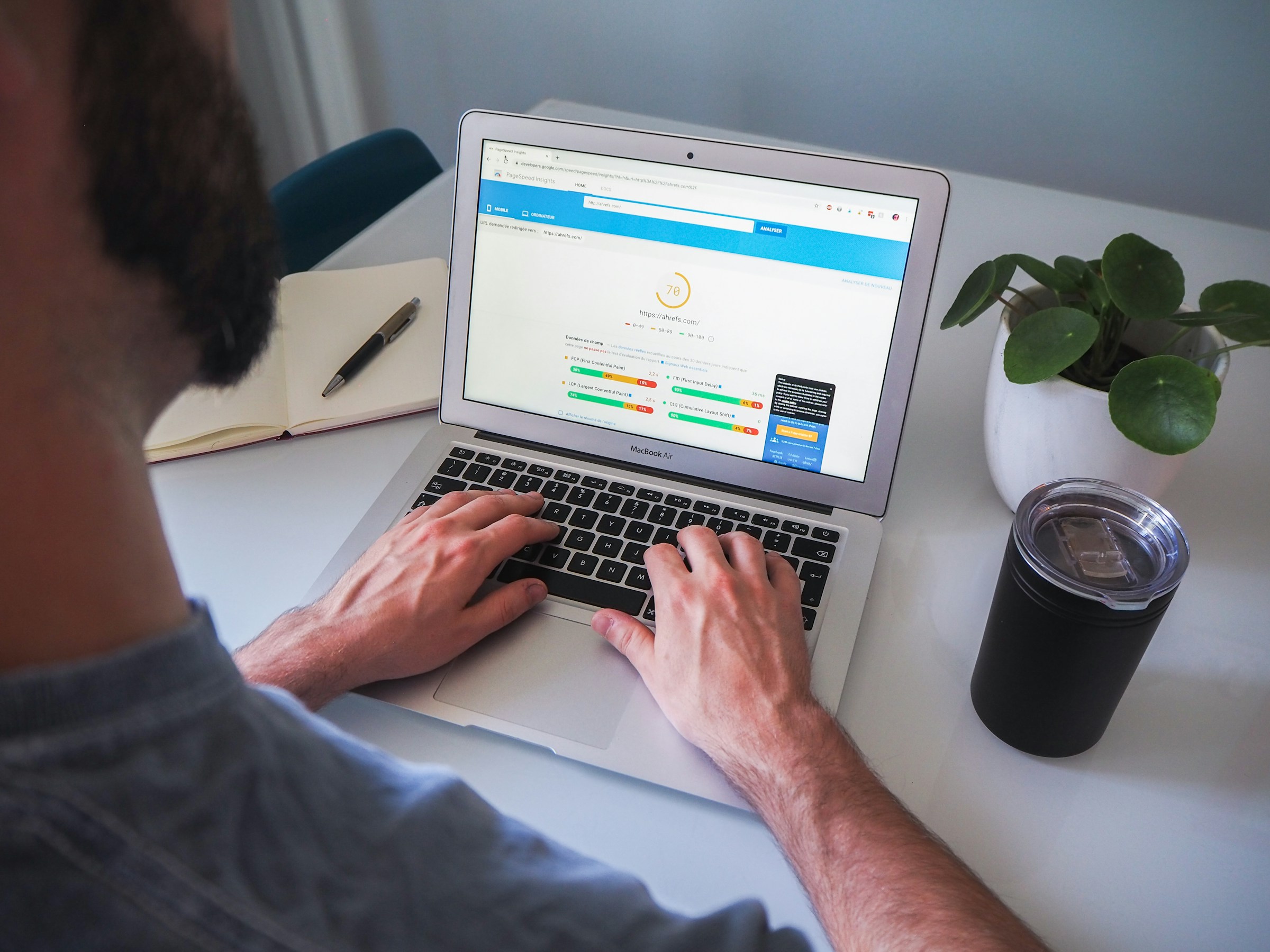 person making checks - Best Tools for SEO for Startups