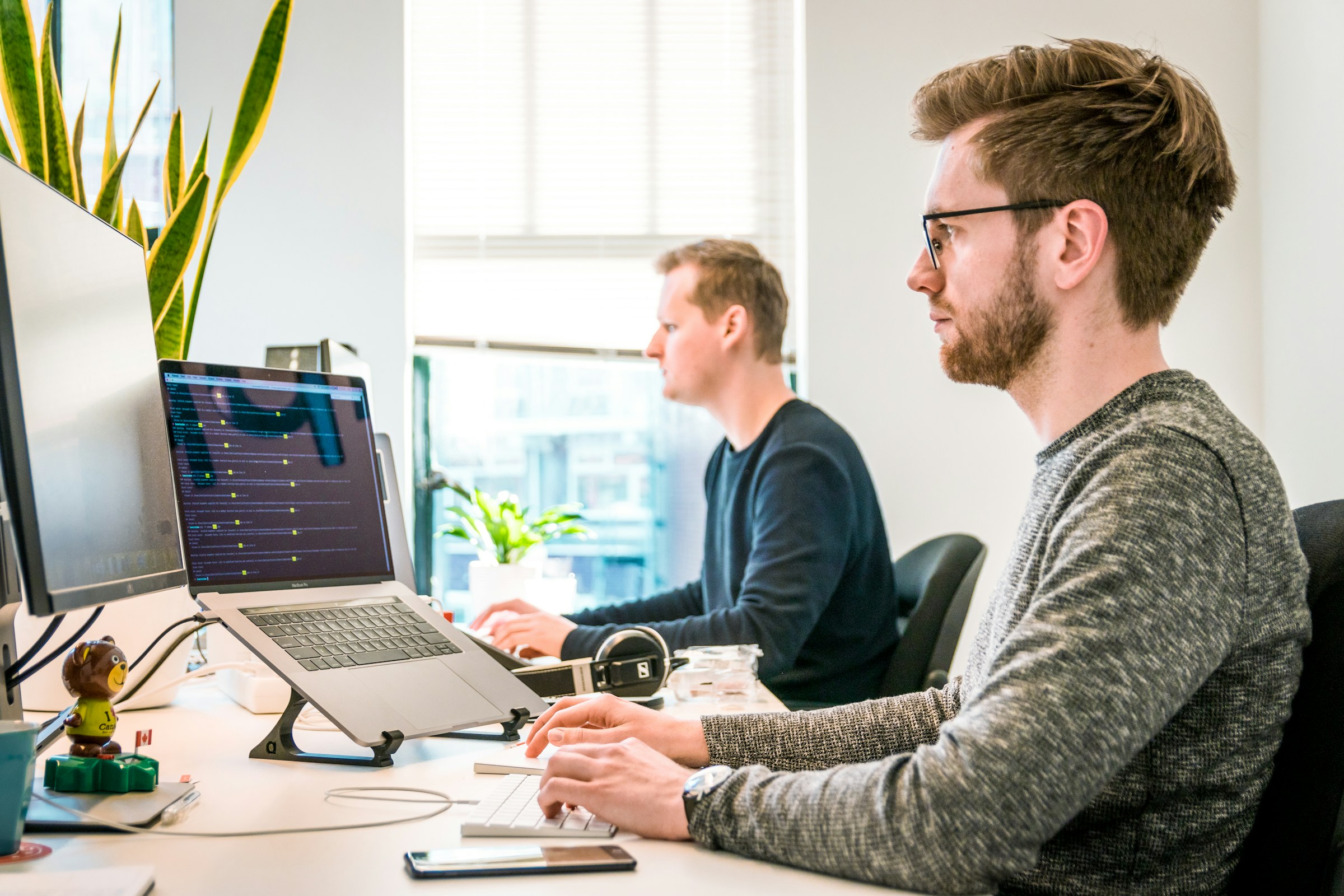 Person making notes - Best Tools for SEO for Startups